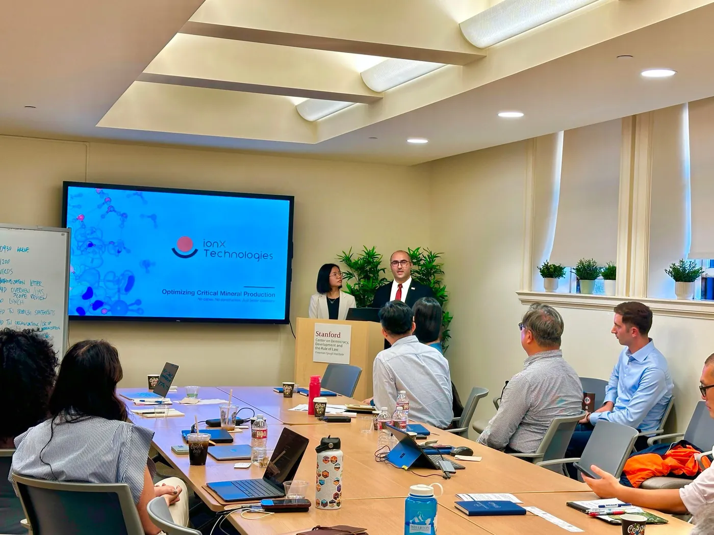 ionX presenting to the visiting Taiwan delegation in a seminar room at Stanford
